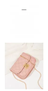Close-up of pink quilted square bag with gold chain strap and metal turn-lock closure