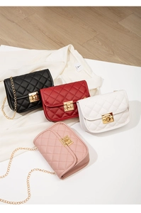 Detailed view of quilted faux leather crossbody bags in black, red, white, and pink options