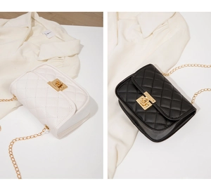 Close-up of quilted pattern and gold twist lock on black and white mini square bags