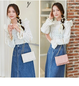 Detailed comparison of quilted white and pink crossbody bags with gold chain straps