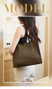 Model view of large tote bag with vintage star pattern and black leather strap