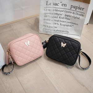 Chic quilted camera bag with butterfly ornament and wide strap in pink and black