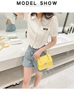 Fashionable bright yellow stone pattern crossbody bag paired with casual summer outfit