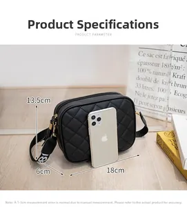 Detail view of black quilted crossbody camera bag showing dimensions 18cm x 13.5cm x 6cm