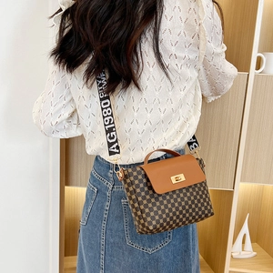 Vintage geometric print crossbody bucket bag with leather flap and wide strap