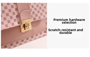 Detail of pink floral crossbody bag featuring durable gold metal buckle and leather texture