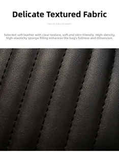 Macro view of black quilted leather with diamond pattern and soft sponge padding