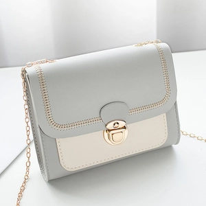 Contrast color small square chain bag with gold buckle and cross-stitch detail