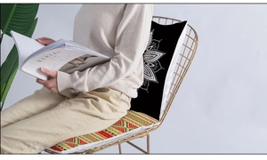Detail of boho mandala cushion cover and striped seat pad in a lifestyle setting