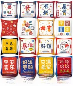 Detailed grid of plush square throw pillows with Chinese characters and festive patterns