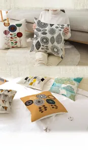 Detail of minimalist polyester cushion covers with various Nordic floral and geometric prints