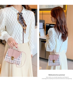 Detailed view of mini plaid crossbody bag with pink flap and golden metal buckle