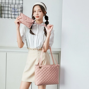 Pink quilted tote and matching clutch set with golden metal rings and large capacity