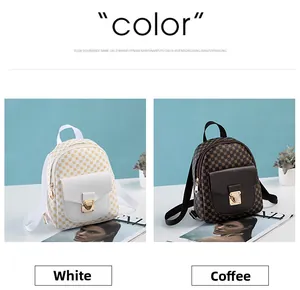 Detailed view of mini printed backpacks in white and coffee with gold metal locks