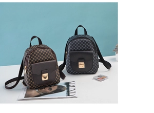 Detail view of mini backpacks in brown and grey featuring geometric checkered patterns