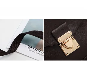 Detail view of gold metal buckle and brown pebbled leather texture on fashion backpack