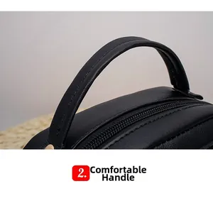 Detail of the comfortable handle on this black quilted leather chain crossbody bag