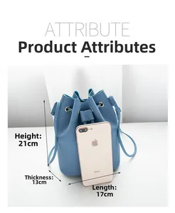 Blue lychee leather bucket bag with drawstring, size 17x21x13cm compared to smartphone