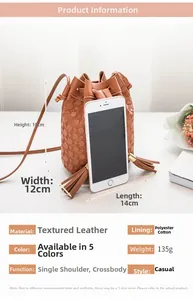 Detail view of brown textured leather bucket bag showing precise size and dimensions