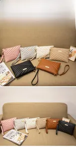 Detailed set of six quilted PU leather wristlet bags with gold hardware in various colors