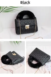 Detail view of black quilted crossbody bag with faux fur handle and gold chain strap