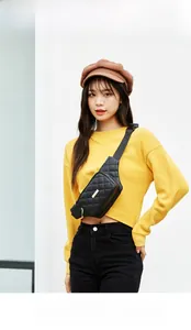 Fashionable black quilted waist bag for women shown as a stylish crossbody chest pack