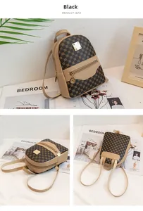 Detail view of mini contrast backpack with dot pattern and gold metal plaque