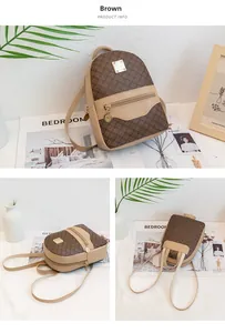 Detail of a mini brown backpack with geometric clover pattern and gold logo plate