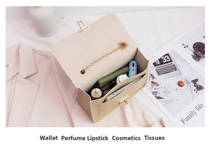 Beige crossbody bag interior showing storage space for phone, wallet and cosmetics
