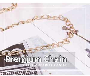 Close-up of premium polished gold flat oval metal chain strap for stylish handbags