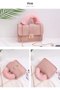 Detail of pink chain bag featuring fuzzy faux fur handle and gold metal twist lock