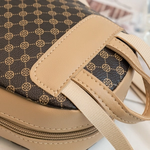 Women's two-tone backpack with clover print leather and beige strap detail