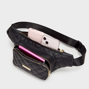 Black quilted waist bag for women with gold zippers and large interior capacity