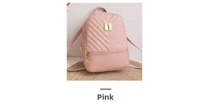 Detailed view of pink mini backpack with V-shape quilting and golden metal hardware accent