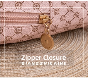 Macro shot of durable gold zipper closure and logo print on pink faux leather bag