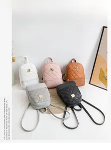Detailed collection of mini quilted backpacks in white pink brown gray and black colors