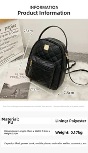 Close-up of black quilted PU leather mini backpack with golden zipper and metal logo