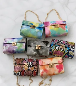 Detailed collection of mini chain bags featuring gradient tie-dye and snakeskin prints
