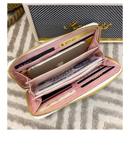 Internal view showing multiple card slots and large capacity of this long zipper wallet
