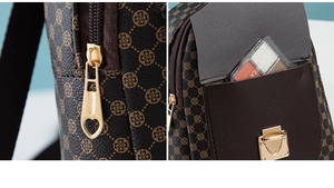 Detail of vintage patterned backpack showing heart zipper and side storage pocket