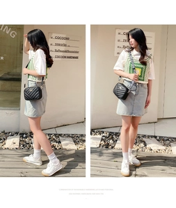 Black quilted crossbody camera bag with jacquard strap styled on a fashion model