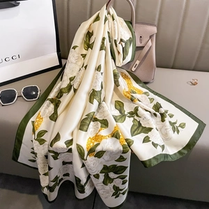 Elegant satin scarf with white camellia flower print and dark green border for women