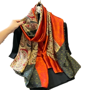 Vintage paisley print silk-like scarf with orange and green ethnic patchwork design