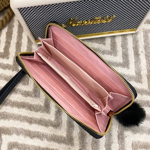 Women's long zipper wallet with wrist strap, multi-slot design and plush pendant detail