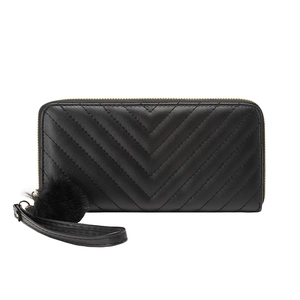 Black chevron quilted leather clutch wallet with gold zipper and pompom wrist strap