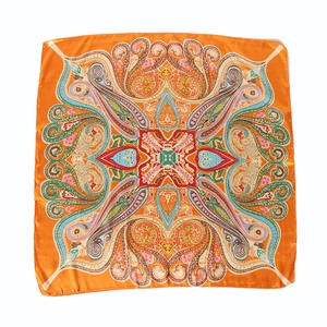 Orange paisley satin silk square scarf with vintage pattern flat lay display