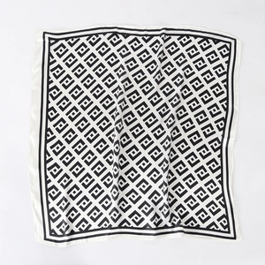 Elegant 60x60cm satin square scarf with interlocking geometric gold letter print