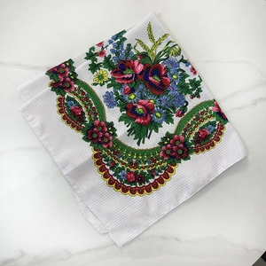 Detail of vintage floral cotton scarf with gold thread stripes and ethnic patterns