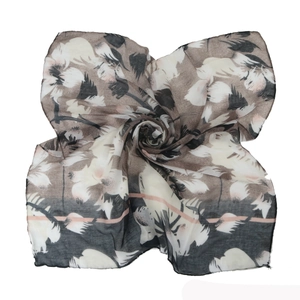 Detail of grey floral print cotton linen scarf with elegant pink stripe accent