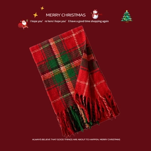 Green and red plaid Christmas scarf with long tassels for winter warmth and holiday style